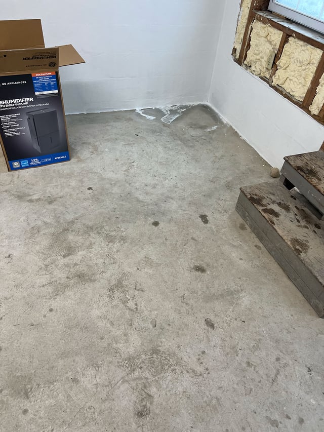 Concrete-coating-in-storage-room-in-Newton,MA-before2